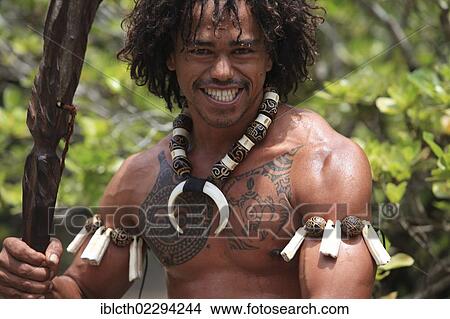 Picture - "Tattooed man performing a war dance, Ua Pou, Marquesas Islands, French Polynesia, Polynesia, South Pacific, Oceania". Fotosearch