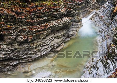 "Taugl stream, washouts, rock layers, autumn, Tauglschlucht, District Hallein, Salzburg, Austria, Europe" View Large Photo Image Stock Image - "Taugl stream, washouts, rock layers, autumn, Tauglschlucht, District Hallein, Salzburg, Austria, Europe". Fotosearch