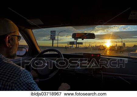 "Taxi driver and the Manhattan skyline at sunset, Manhattan, New York City, New York, United States, North America" View Large Photo Image Stock Photo - "Taxi driver and the Manhattan skyline at sunset, Manhattan, New York City, New York, United States, North America". Fotosearch