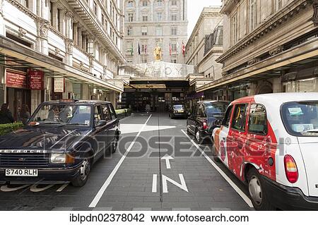 "Taxis parked outside the main entrance to Savoy Hotel in the Strand, London, England, United Kingdom, Europe" View Large Photo Image Stock Image - "Taxis parked outside the main entrance to Savoy Hotel in the Strand, London, England, United Kingdom, Europe". Fotosearch