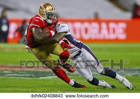 "TE Delanie Walker, #46 49ers, is tackled during the NFL International game between the San Francisco 49ers and the Denver Broncos on October 31, 2010 in London, England, United Kingdom, Europe" View Large Photo Image Stock Image - "TE Delanie Walker, #46 49ers, is tackled during the NFL International game between the San Francisco 49ers and the Denver Broncos on October 31, 2010 in London, England, United Kingdom, Europe". Fotosearch