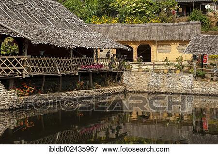 "Tea shop in a village of the Chinese minority on the border with Myanmar, Ban Rak Thai or Mae Aw, Northern Thailand, Thailand, Asia" View Large Photo Image Stock Photo - "Tea shop in a village of the Chinese minority on the border with Myanmar, Ban Rak Thai or Mae Aw, Northern Thailand, Thailand, Asia". Fotosearch