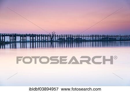 "Teak bridge in the evening light, U Bein bridge across Thaungthaman Lake, Amarapura, Mandalay Division, Myanmar, Asia" View Large Photo Image Stock Photo - "Teak bridge in the evening light, U Bein bridge across Thaungthaman Lake, Amarapura, Mandalay Division, Myanmar, Asia". Fotosearch
