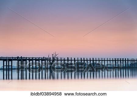 "Teak bridge in the evening light, U Bein bridge across Thaungthaman Lake, Amarapura, Mandalay Division, Myanmar, Asia" View Large Photo Image Stock Photo - "Teak bridge in the evening light, U Bein bridge across Thaungthaman Lake, Amarapura, Mandalay Division, Myanmar, Asia". Fotosearch