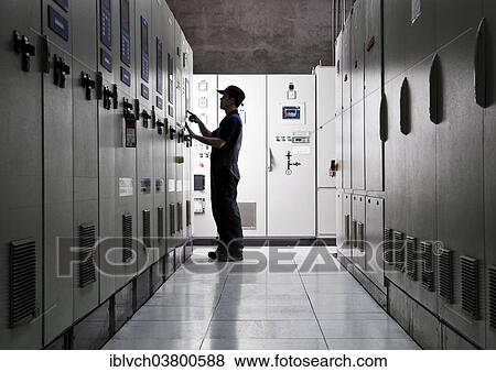 "Technicians in the electrical distribution room, Landfrischmolkerei dairy, Wels, Upper Austria, Austria, Europe" View Large Photo Image Stock Photo - "Technicians in the electrical distribution room, Landfrischmolkerei dairy, Wels, Upper Austria, Austria, Europe". Fotosearch