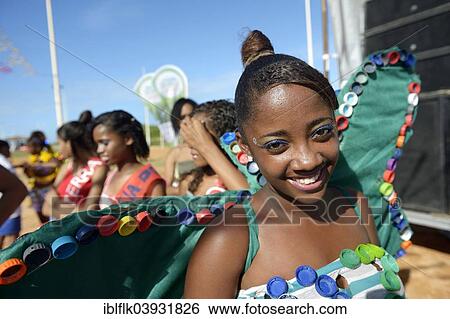 "Teenage girl presenting a butterfly costume made of recycled materials such as lids of plastic bottles at a fashion show of a social project, Salvador da Bahia, Bahia, Brazil, South America" View Large Photo Image Stock Photograph - "Teenage girl presenting a butterfly costume made of recycled materials such as lids of plastic bottles at a fashion show of a social project, Salvador da Bahia, Bahia, Brazil, South America". Fotosearch