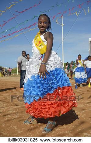 "Teenage girl presenting a dress made of recycled disposable plastic cups at a fashion show of a social project, Salvador da Bahia, Bahia, Brazil, South America" View Large Photo Image Stock Photography - "Teenage girl presenting a dress made of recycled disposable plastic cups at a fashion show of a social project, Salvador da Bahia, Bahia, Brazil, South America". Fotosearch