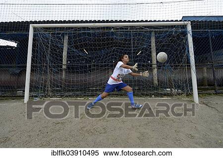"Teenager, 16 years, goalkeeper saving the ball, Craque do Amanha social project, Sao Goncalo, Niteroi, Rio de Janeiro State, Brazil, South America" View Large Photo Image Stock Photography - "Teenager, 16 years, goalkeeper saving the ball, Craque do Amanha social project, Sao Goncalo, Niteroi, Rio de Janeiro State, Brazil, South America". Fotosearch