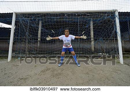 "Teenager, 16 years, goalkeeper, standing in the goal with outstretched arms, Craque do Amanha social project, Sao Goncalo, Niteroi, Rio de Janeiro State, Brazil, South America" View Large Photo Image Stock Photo - "Teenager, 16 years, goalkeeper, standing in the goal with outstretched arms, Craque do Amanha social project, Sao Goncalo, Niteroi, Rio de Janeiro State, Brazil, South America". Fotosearch