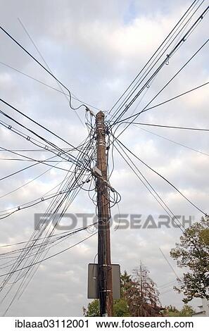 "Telephone pole with tangled cables, Bucharest, Romania, Europe" View Large Photo Image Stock Image - "Telephone pole with tangled cables, Bucharest, Romania, Europe". Fotosearch