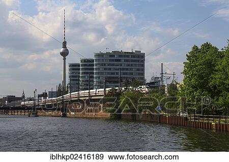 Stock Photo - Television tower at Alexanderplatz square, viewed across the Spree river, Berlin, Germany, Europe. Fotosearch