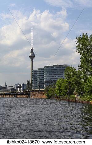 Television tower on Alexanderplatz square as seen from the Spree river, Berlin, Germany, Europe View Large Photo Image Stock Image - Television tower on Alexanderplatz square as seen from the Spree river, Berlin, Germany, Europe. Fotosearch