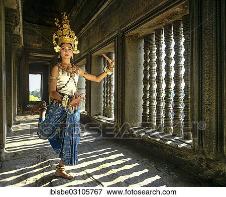 "Temple dancer or apsara posing in front of the baluster windows in the temple of Angkor Wat, UNESCO World Cultural Heritage Site, Siem Reap, Siem Reap Province, Cambodia, Asia" View Large Photo Image Stock Photo - "Temple dancer or apsara posing in front of the baluster windows in the temple of Angkor Wat, UNESCO World Cultural Heritage Site, Siem Reap, Siem Reap Province, Cambodia, Asia". Fotosearch