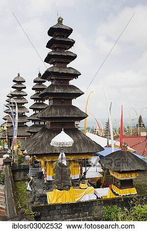 "Temple festival, Besakih Temple and pilgrimage shrine at the foot of Mount Agung decorated with flags and umbrellas, Besakih, Bali, Indonesia, Asia" View Large Photo Image Stock Image - "Temple festival, Besakih Temple and pilgrimage shrine at the foot of Mount Agung decorated with flags and umbrellas, Besakih, Bali, Indonesia, Asia". Fotosearch