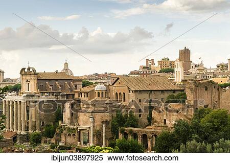 Stock Photography - "Temple of Antoninus and Faustina on the left, 141 AD, Romulus Temple, the Basilica of Maxentius, Torre delle Milizie tower at the back, Roman Forum, Rome, Lazio, Italy, Europe". Fotosearch