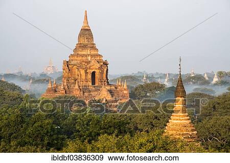 "Temples in the morning light, stupas and pagodas in the temple complex of the Plateau of Bagan, Mandalay Division, Myanmar or Burma" View Large Photo Image Stock Photo - "Temples in the morning light, stupas and pagodas in the temple complex of the Plateau of Bagan, Mandalay Division, Myanmar or Burma". Fotosearch