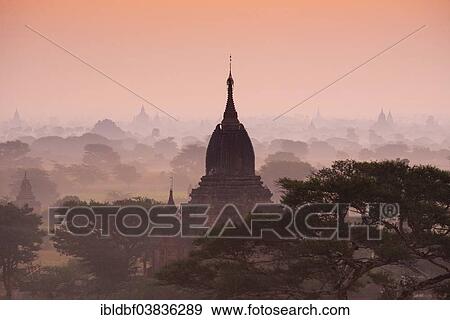 "Temples in the morning mist, stupas and pagodas in the temple complex of the Plateau of Bagan, Mandalay Division, Myanmar or Burma" View Large Photo Image Stock Photo - "Temples in the morning mist, stupas and pagodas in the temple complex of the Plateau of Bagan, Mandalay Division, Myanmar or Burma". Fotosearch
