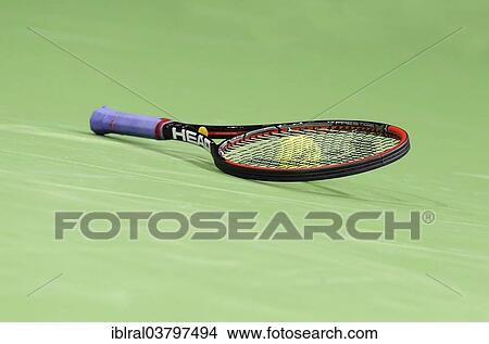 "Tennis racket on the ground, Germany, Europe" View Large Photo Image Picture - "Tennis racket on the ground, Germany, Europe". Fotosearch
