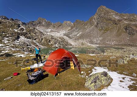 Stock Photo - Tent in the Stubai Alps, Lake Rinnensee, Tyrol, Austria, Europe. Fotosearch