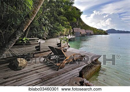 "Terrace in a holiday resort, Batbitim Island, Raja-Ampat, West Papua, Indonesia, Asia" View Large Photo Image Stock Image - "Terrace in a holiday resort, Batbitim Island, Raja-Ampat, West Papua, Indonesia, Asia". Fotosearch