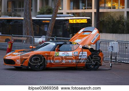 Stock Photo - "Tesla sports car, electric car, being recharged at a charging station, Rallye Monte-Carlo des Energies Nouvelles in 2014, Principality of Monaco". Fotosearch