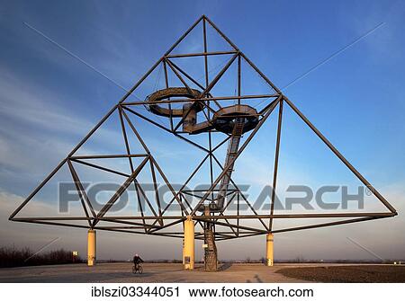 "Tetraeder, a tetrahedron as an artwork on the Beckstrasse slag heap, Batenbrock, Bottrop, Ruhr district, North Rhine-Westphalia, Germany, Europe" View Large Photo Image Stock Image - "Tetraeder, a tetrahedron as an artwork on the Beckstrasse slag heap, Batenbrock, Bottrop, Ruhr district, North Rhine-Westphalia, Germany, Europe". Fotosearch