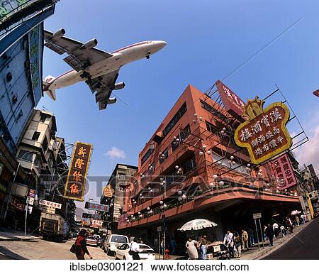 "Thai Airways aircraft approaching Kai Tak Airport over the rooftops of Kowloon, Hong Kong, China, Asia, Kowloon, Hong Kong, Hong Kong, China, People's Republic of China, Asia" View Large Photo Image Stock Image - "Thai Airways aircraft approaching Kai Tak Airport over the rooftops of Kowloon, Hong Kong, China, Asia, Kowloon, Hong Kong, Hong Kong, China, People's Republic of China, Asia". Fotosearch