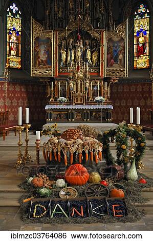 Stock Photograph - "Thanksgiving decoration in front of the polyptych altar in the neo-Gothic Parish Church of St. Pelagius, 1860, Weitnau, Oberallgau, Allgau, Swabia, Bavaria, Germany, Europe". Fotosearch