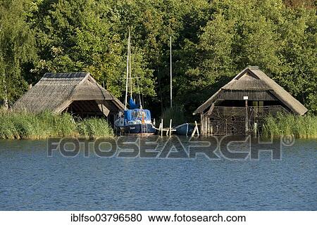 "Thatched boathouses at the harbour of Prerow, Prerow, Darss, Mecklenburg-Western Pomerania, Germany, Europe" View Large Photo Image Stock Image - "Thatched boathouses at the harbour of Prerow, Prerow, Darss, Mecklenburg-Western Pomerania, Germany, Europe". Fotosearch