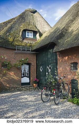 "Thatched holiday cottage in Nieblum, Foehr island, North Frisia, Schleswig-Holstein, Germany, Europe" View Large Photo Image Stock Photo - "Thatched holiday cottage in Nieblum, Foehr island, North Frisia, Schleswig-Holstein, Germany, Europe". Fotosearch