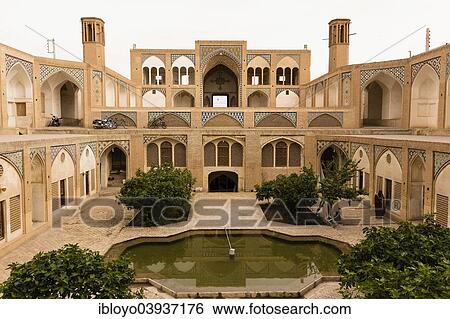 Stock Photograph - "The 18th century Agha Bozorg Mosque and its sunken courtyard, Kashan, Iran, Asia". Fotosearch
