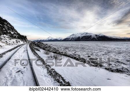 "The Alaska Railroad tracks along Turnagain Arm, Alaska" View Large Photo Image Stock Image - "The Alaska Railroad tracks along Turnagain Arm, Alaska". Fotosearch