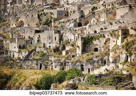 "The ancient cave dwellings, known as Sassi, Sassi di Matera, UNESCO World Heritage Site, Matera, Basilicata, Italy, Europe" View Large Photo Image Stock Image - "The ancient cave dwellings, known as Sassi, Sassi di Matera, UNESCO World Heritage Site, Matera, Basilicata, Italy, Europe". Fotosearch