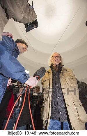 Stock Photo - "The artist Christo with journalists at the opening of the exhibition of the Christo-installation """"Big Air Package"""" in the Gasometer Oberhausen, Oberhausen, North Rhine-Westphalia, Germany, Europe". Fotosearch