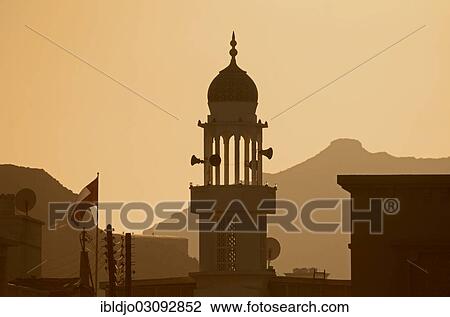 "The back-lit minaret of a small mosque, Muttrah, Muscat Governorate (Capital Area, Oman, Asia" View Large Photo Image Stock Image - "The back-lit minaret of a small mosque, Muttrah, Muscat Governorate (Capital Area, Oman, Asia". Fotosearch