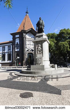 "The Banco de Portugal with the monument to Joao Goncaves Zarco, Av Arriaga in the old town of Funchal, Santa Luzia, Funchal, Madeira, Portugal, Europe" View Large Photo Image Stock Image - "The Banco de Portugal with the monument to Joao Goncaves Zarco, Av Arriaga in the old town of Funchal, Santa Luzia, Funchal, Madeira, Portugal, Europe". Fotosearch