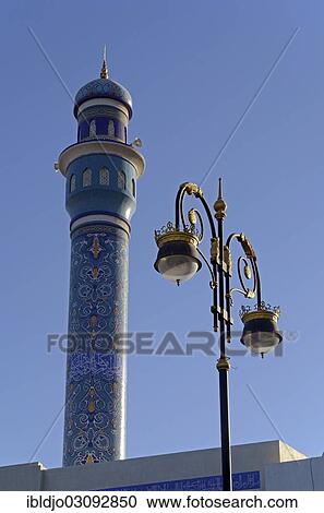 "The blue minaret of Rasool Azam Mosque and a streetlamp at the Corniche of Muttrah, Muttrah, Muscat Governorate (Capital Area, Oman, Asia" View Large Photo Image Stock Image - "The blue minaret of Rasool Azam Mosque and a streetlamp at the Corniche of Muttrah, Muttrah, Muscat Governorate (Capital Area, Oman, Asia". Fotosearch