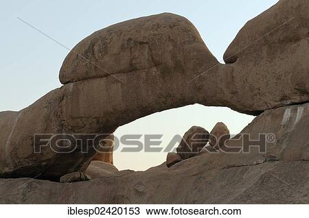 The Bridge rock formation, natural stone arch, Pontok Mountains, Great Spitzkoppe Mountain, Spitzkoppe, Grosse Spitzkuppe Nature Reserve, Namibia, Africa View Large Photo Image Stock Image - The Bridge rock formation, natural stone arch, Pontok Mountains, Great Spitzkoppe Mountain, Spitzkoppe, Grosse Spitzkuppe Nature Reserve, Namibia, Africa. Fotosearch