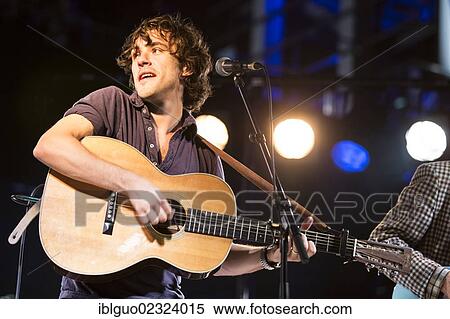 Stock Photography - "The British singer songwriter Jack Savoretti playing live outside KKL Plaza at the Blue Balls Festival, Lucerne, Switzerland, Europe". Fotosearch