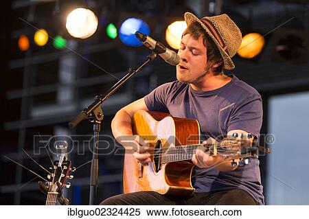 "The British singer songwriter Jon Kenzie playing live outside KKL Plaza at the Blue Balls Festival, Lucerne, Switzerland, Europe" View Large Photo Image Stock Photography - "The British singer songwriter Jon Kenzie playing live outside KKL Plaza at the Blue Balls Festival, Lucerne, Switzerland, Europe". Fotosearch