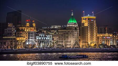 Stock Photography - "The Bund at night with the Bank of China building and the Fairmont Peace Hotel, from Pudong, Shanghai, China, Asia". Fotosearch