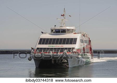 "The catamaran Halunder Jet entering the harbour of Heligoland, Helgoland, Schleswig-Holstein, Germany, Europe" View Large Photo Image Stock Photo - "The catamaran Halunder Jet entering the harbour of Heligoland, Helgoland, Schleswig-Holstein, Germany, Europe". Fotosearch