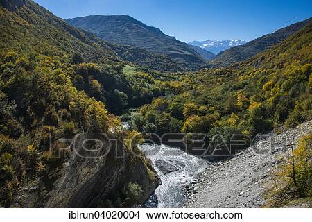 "The caucasian mountains in fall with the Argun river, Chechnya, Caucasus, Russia, Europe" View Large Photo Image Picture - "The caucasian mountains in fall with the Argun river, Chechnya, Caucasus, Russia, Europe". Fotosearch