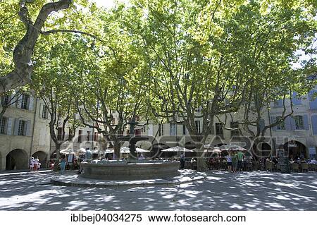 "The central square Place aux Herbes and its fountain, Uzes, Gard, Languedoc-Roussillon, France, Europe" View Large Photo Image Stock Photography - "The central square Place aux Herbes and its fountain, Uzes, Gard, Languedoc-Roussillon, France, Europe". Fotosearch