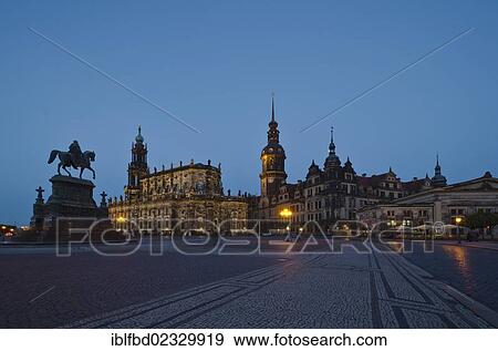 Stock Photo - "The church """"Hofkirche"""" and Dresden Castle at night, seen from Dresden Opera, the """"Semperoper"""". Dresden, Germany, Europe". Fotosearch