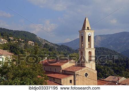 "The church of the small village Evisa illuminated by warm evening light surrounded by mountains. Evisa is in the department Corse-du-Sud, France on the mediterranean island of Corsica, Evisa, Corsica, France, Europe" View Large Photo Image Stock Photography - "The church of the small village Evisa illuminated by warm evening light surrounded by mountains. Evisa is in the department Corse-du-Sud, France on the mediterranean island of Corsica, Evisa, Corsica, France, Europe". Fotosearch