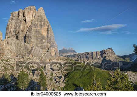 Stock Photography - "The Cima Grande peak in the Cinque Torri with blue sky, the mountains Croda da Lago and Lastoi de Formin at the back, Dolomites, Veneto, Italy, Europe". Fotosearch
