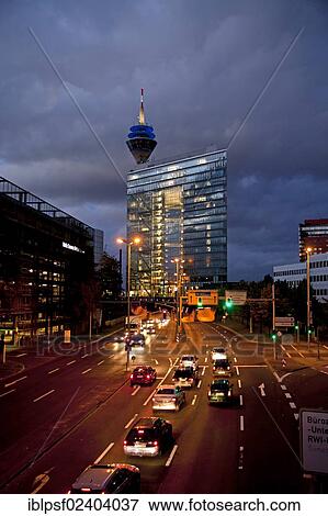 "The city gate, an office tower and the official seat of the minister-president of North Rhine-Westphalia, the Rheinturm tower and a federal highway, Duesseldorf, North Rhine-Westphalia, Germany, Europe" View Large Photo Image Stock Photo - "The city gate, an office tower and the official seat of the minister-president of North Rhine-Westphalia, the Rheinturm tower and a federal highway, Duesseldorf, North Rhine-Westphalia, Germany, Europe". Fotosearch