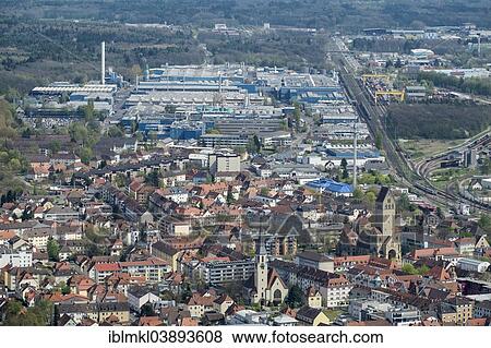 "The city of Singen am Hohentwiel with the aluminum plant, Baden-Wurttemberg, Germany, Europe" View Large Photo Image Stock Photo - "The city of Singen am Hohentwiel with the aluminum plant, Baden-Wurttemberg, Germany, Europe". Fotosearch