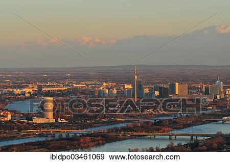"The city of Vienna and the New Danube river at dusk, seen from the Kahlenberg mountain, Vienna, Vienna State, Austria, Europe" View Large Photo Image Stock Photo - "The city of Vienna and the New Danube river at dusk, seen from the Kahlenberg mountain, Vienna, Vienna State, Austria, Europe". Fotosearch
